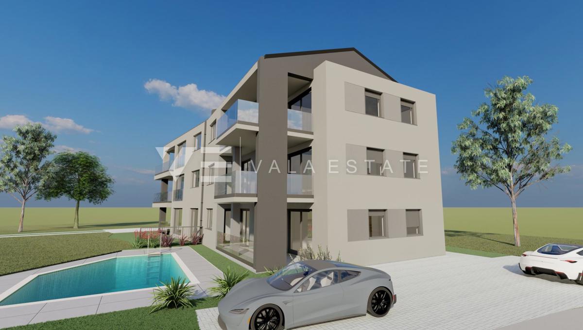 APPARTAMENTO AL PIANO TERRA CON GIARDINO E PISCINA CONDOMINIALE