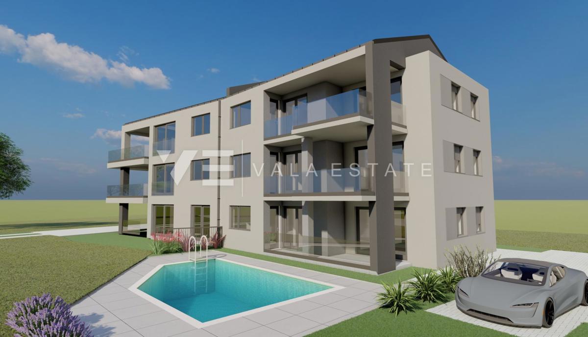 APPARTAMENTO AL PIANO TERRA CON GIARDINO E PISCINA CONDOMINIALE