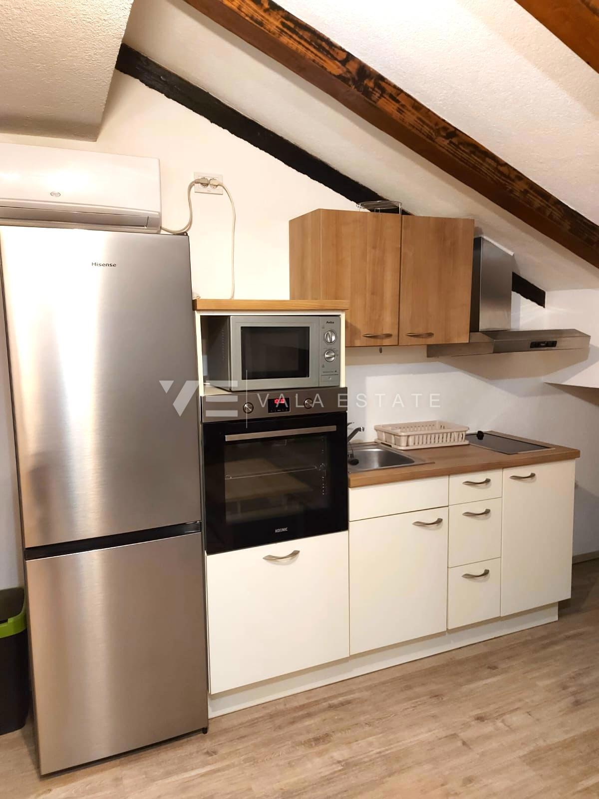 DUE APPARTAMENTI ARREDATI CON GIARDINO IN POSIZIONE TRANQUILLA