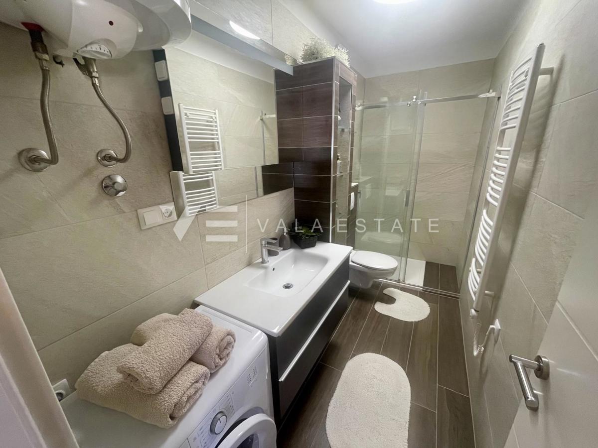 DUE APPARTAMENTI ARREDATI CON GIARDINO IN POSIZIONE TRANQUILLA