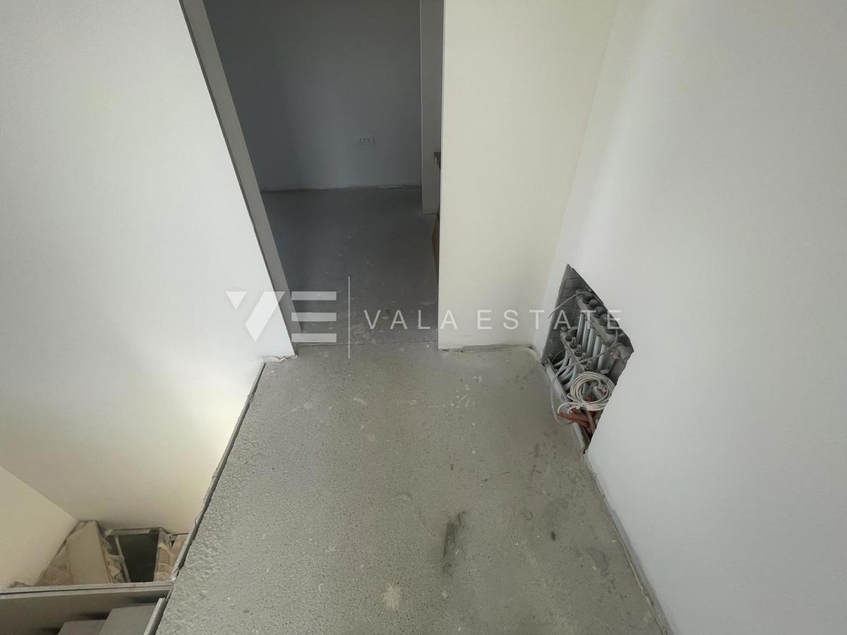 APPARTAMENTO SU DUE PIANI IN NUOVA COSTRUZIONE IN POSIZIONE ATTRAENTE