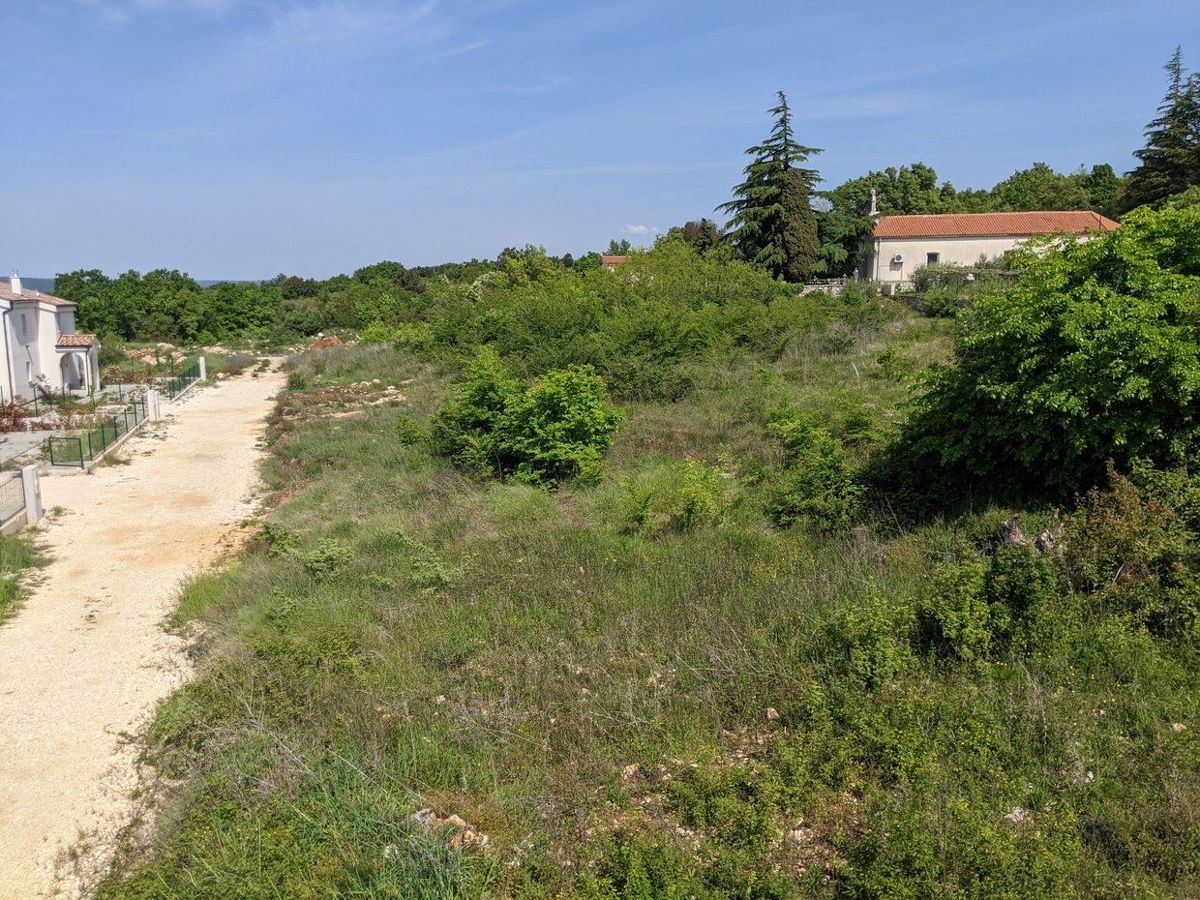 Labin, terreno con licenza edilizia, vista mare