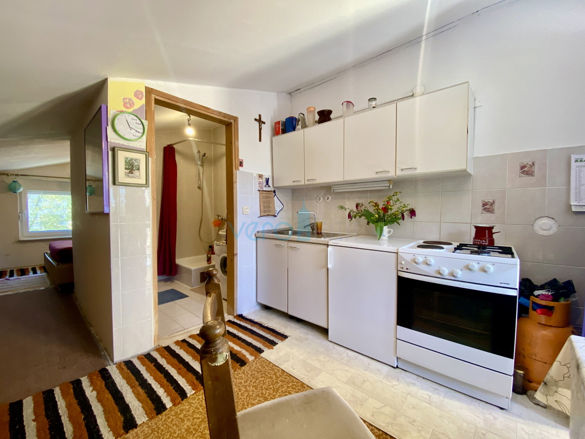 Isola di Krk, Dobrinj, periferia, casa bifamiliare con due appartamenti, vista, terreno, vendita