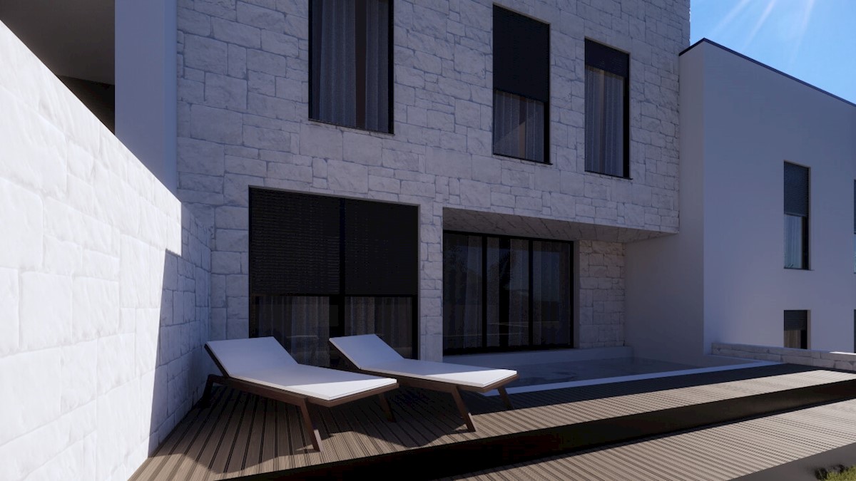 Moderno appartamento con giardino e piscina, a 200 m dalla spiaggia