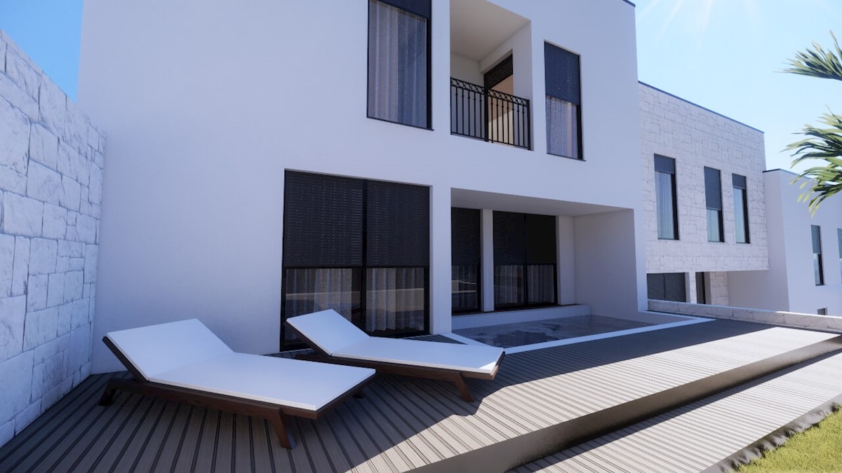 Moderno appartamento con giardino e piscina, a 200 m dalla spiaggia