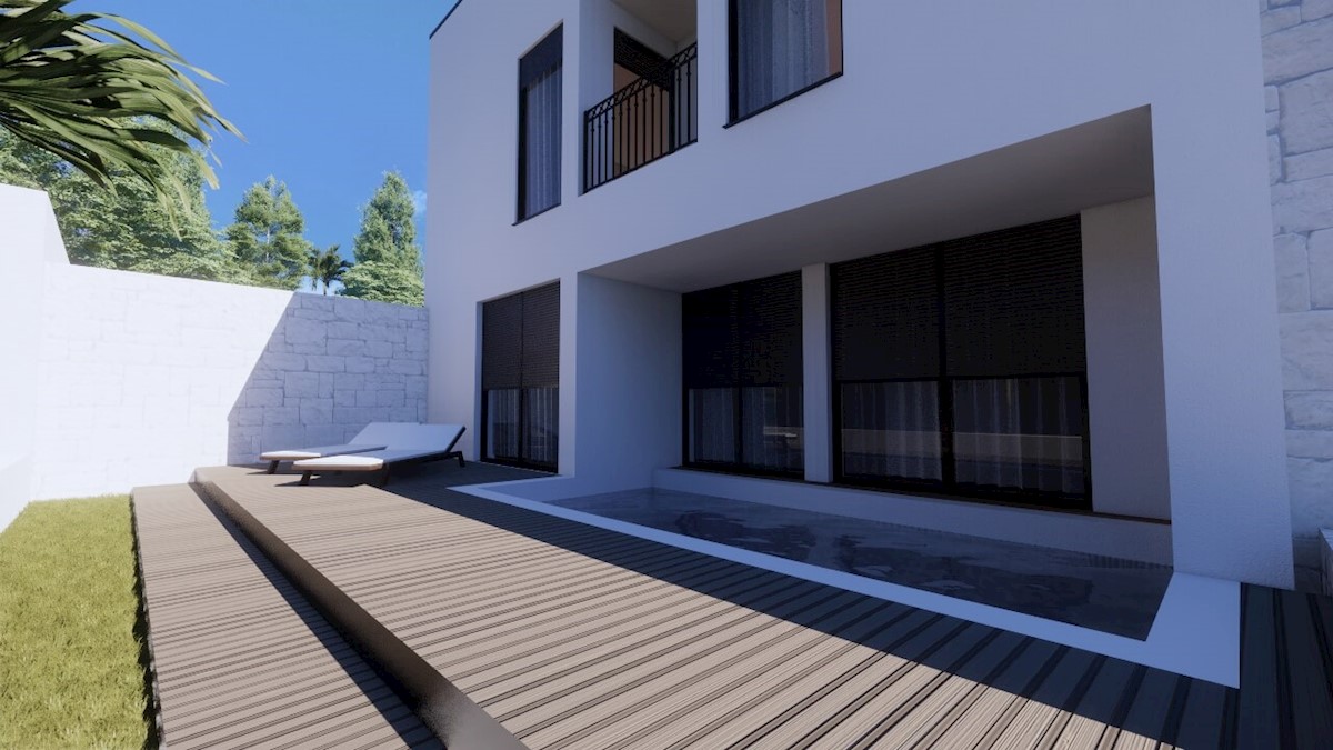 Moderno appartamento con giardino e piscina, a 200 m dalla spiaggia