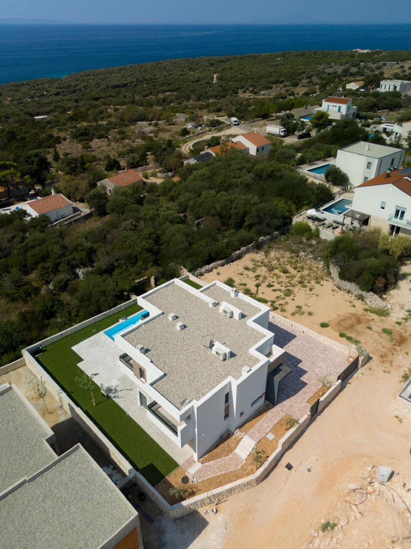 Novalja, località Škuncini, villa moderna (238 m2) con piscina e vista panoramica sul mare, NUOVA COSTRUZIONE
