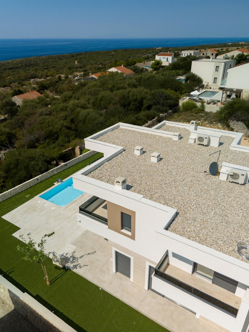 Novalja, località Škuncini, villa moderna (238 m2) con piscina e vista panoramica sul mare, NUOVA COSTRUZIONE