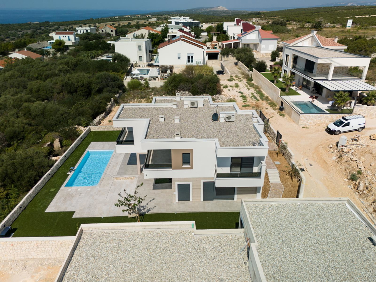 Novalja, località Škuncini, villa moderna (238 m2) con piscina e vista panoramica sul mare, NUOVA COSTRUZIONE