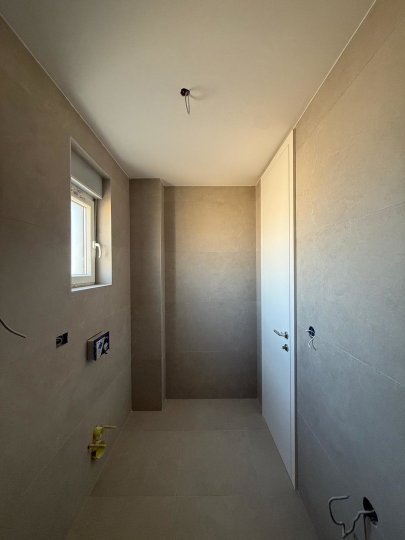 Novalja, Škuncini stani, villa moderna (238m2) in costruzione con piscina e vista panoramica sul mare