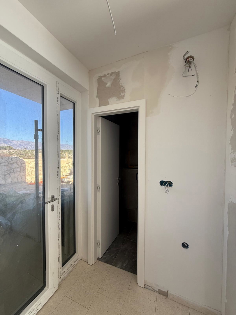 Novalja, Škuncini stani, villa moderna (238m2) in costruzione con piscina e vista panoramica sul mare