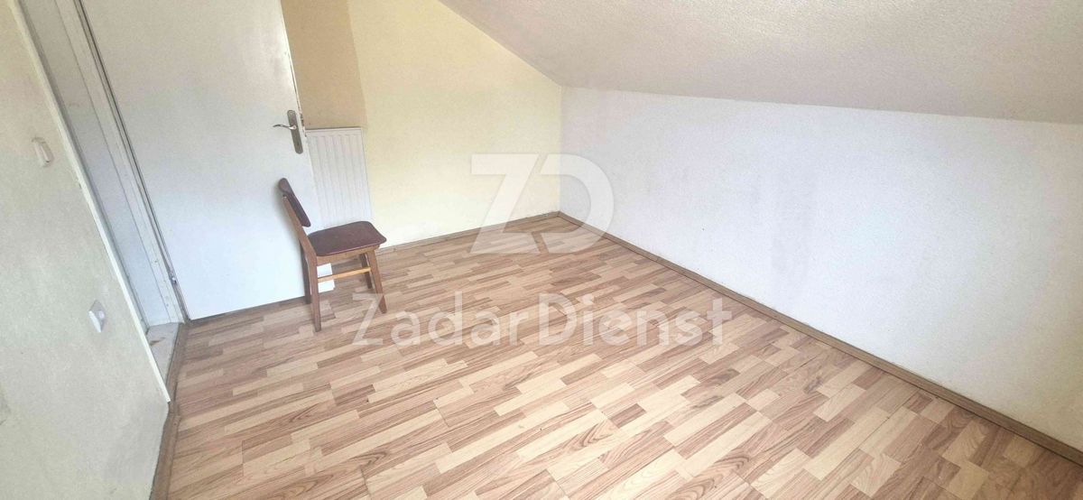 Casa con 3 unità abitative e terreno spazioso