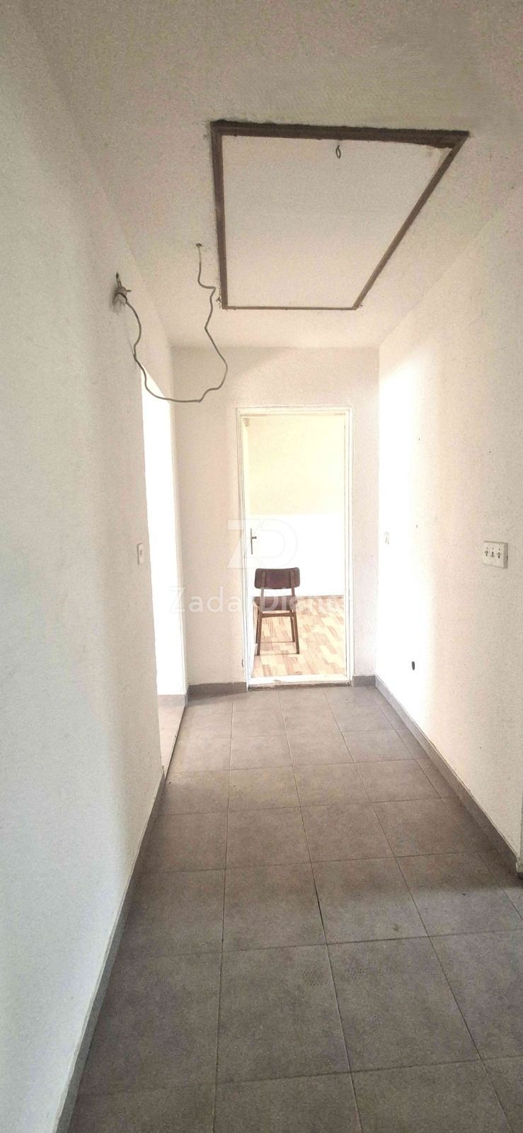 Casa con 3 unità abitative e terreno spazioso