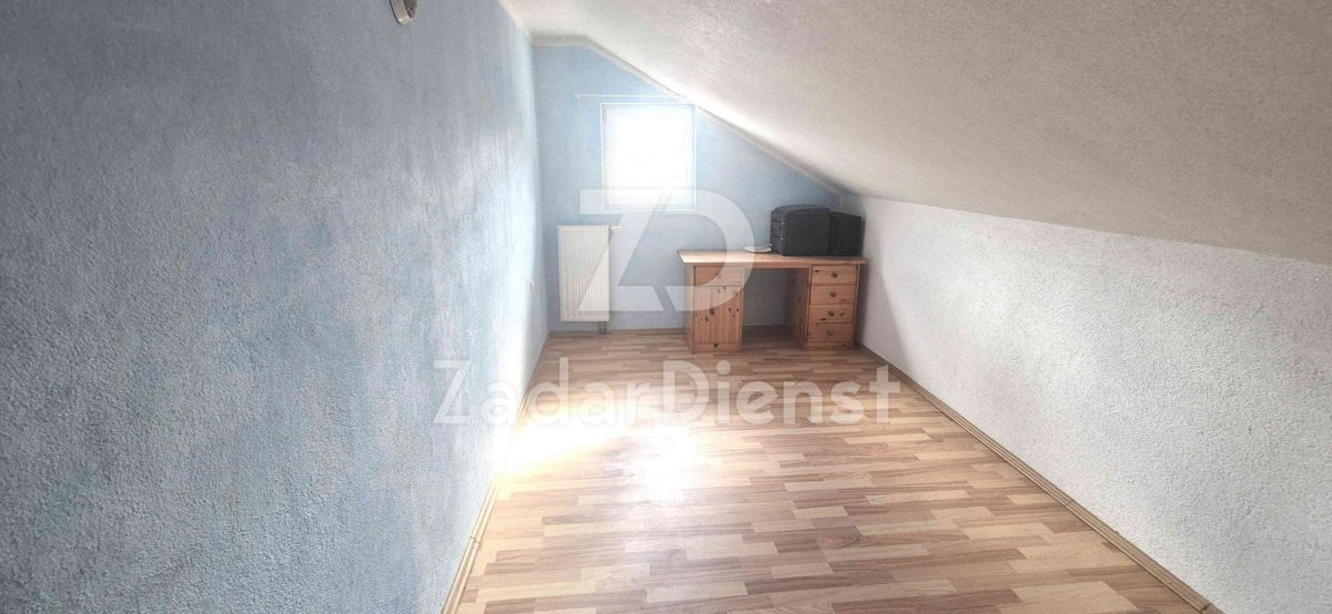 Casa con 3 unità abitative e terreno spazioso